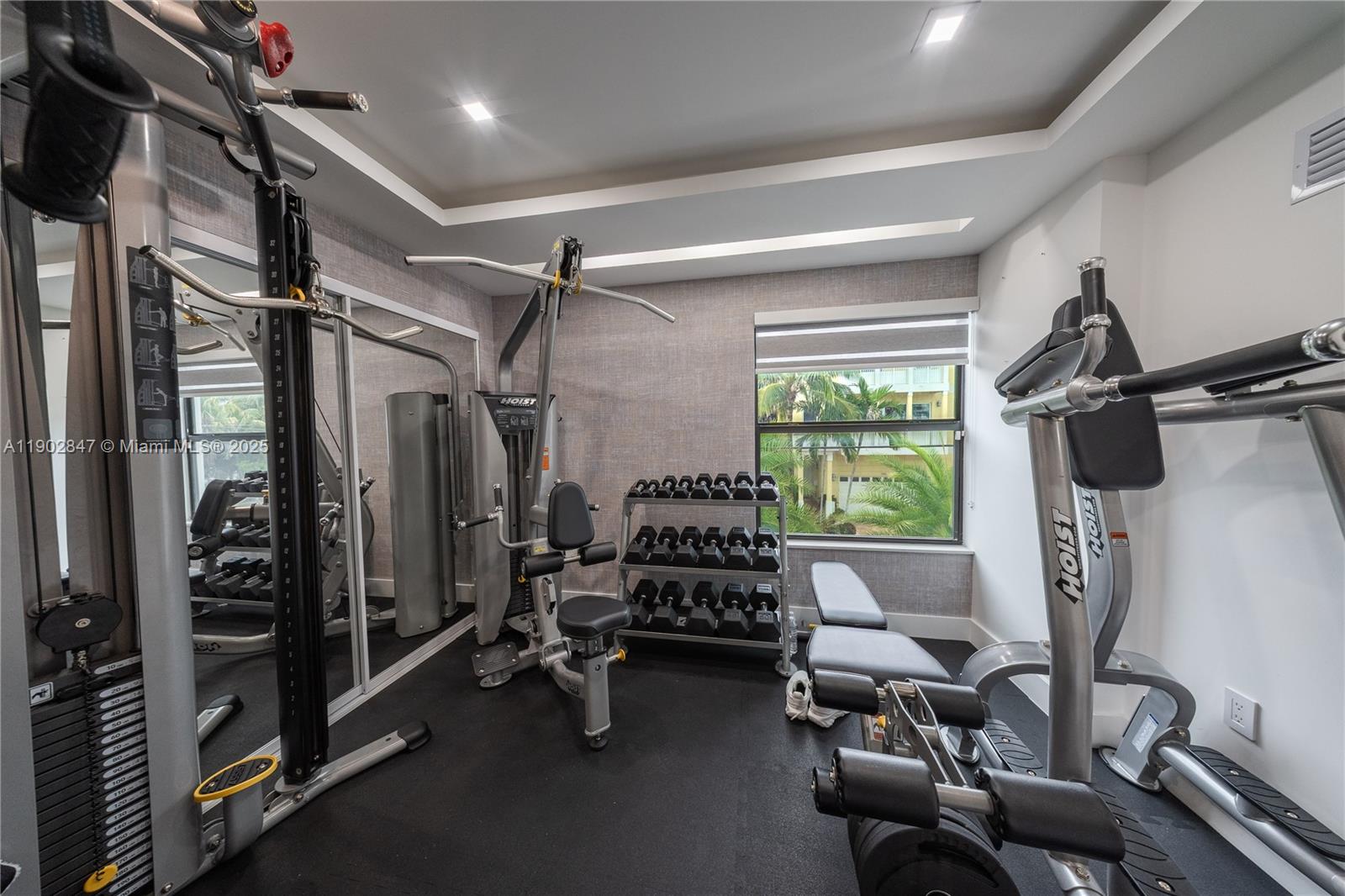 5601 North Ocean Drive Hollywood, FL 33019 - Photo 35 of 78 a living room with furniture gym equipment and a window