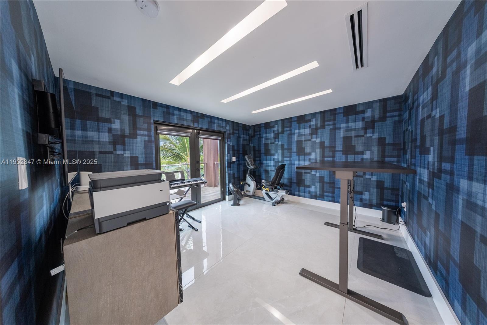 5601 North Ocean Drive Hollywood, FL 33019 - Photo 43 of 78 a view of a room with gym equipment