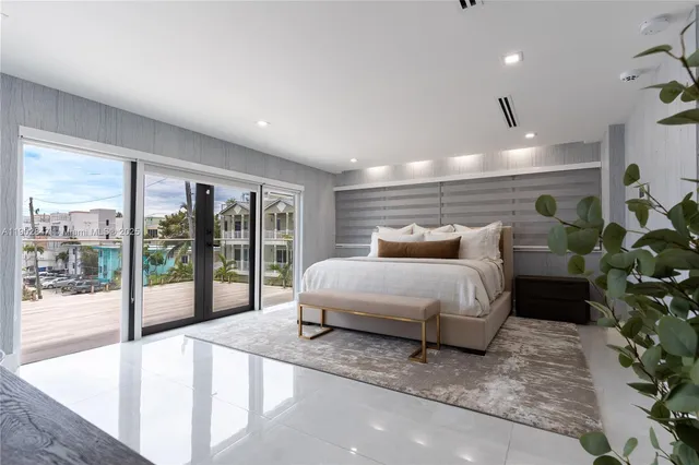 an aerial view of a house with a lake view