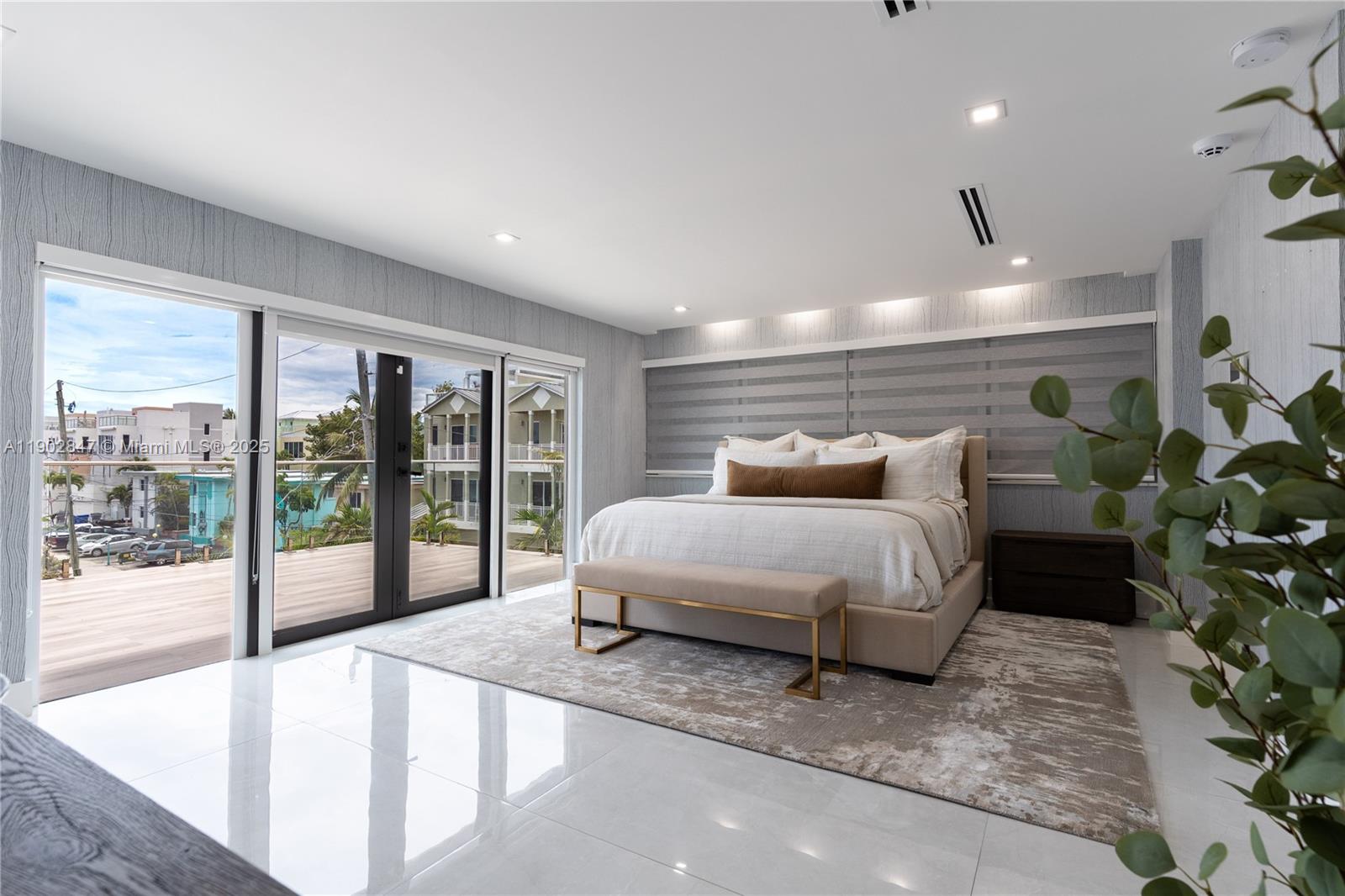 5601 North Ocean Drive Hollywood, FL 33019 - Photo 47 of 78 a bed room with a bed and a large window