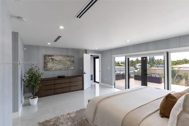 a aerial view of a house with a yard patio and swimming pool