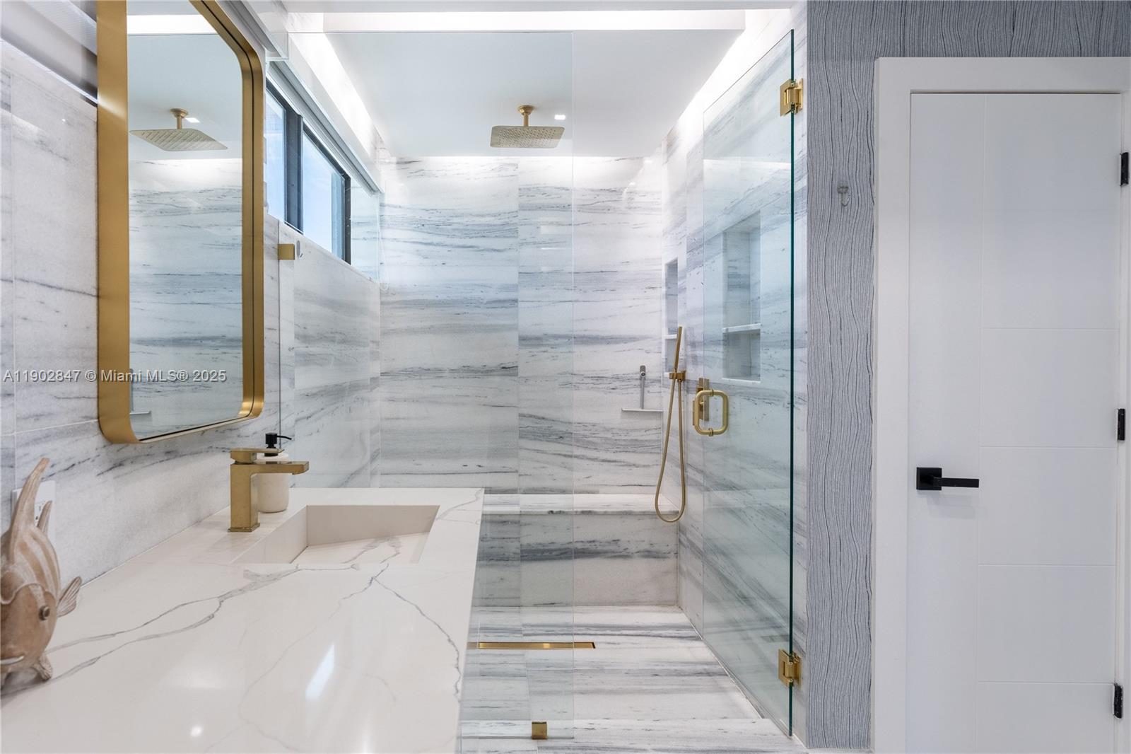 5601 North Ocean Drive Hollywood, FL 33019 - Photo 57 of 78 a bathroom with a bathtub and shower