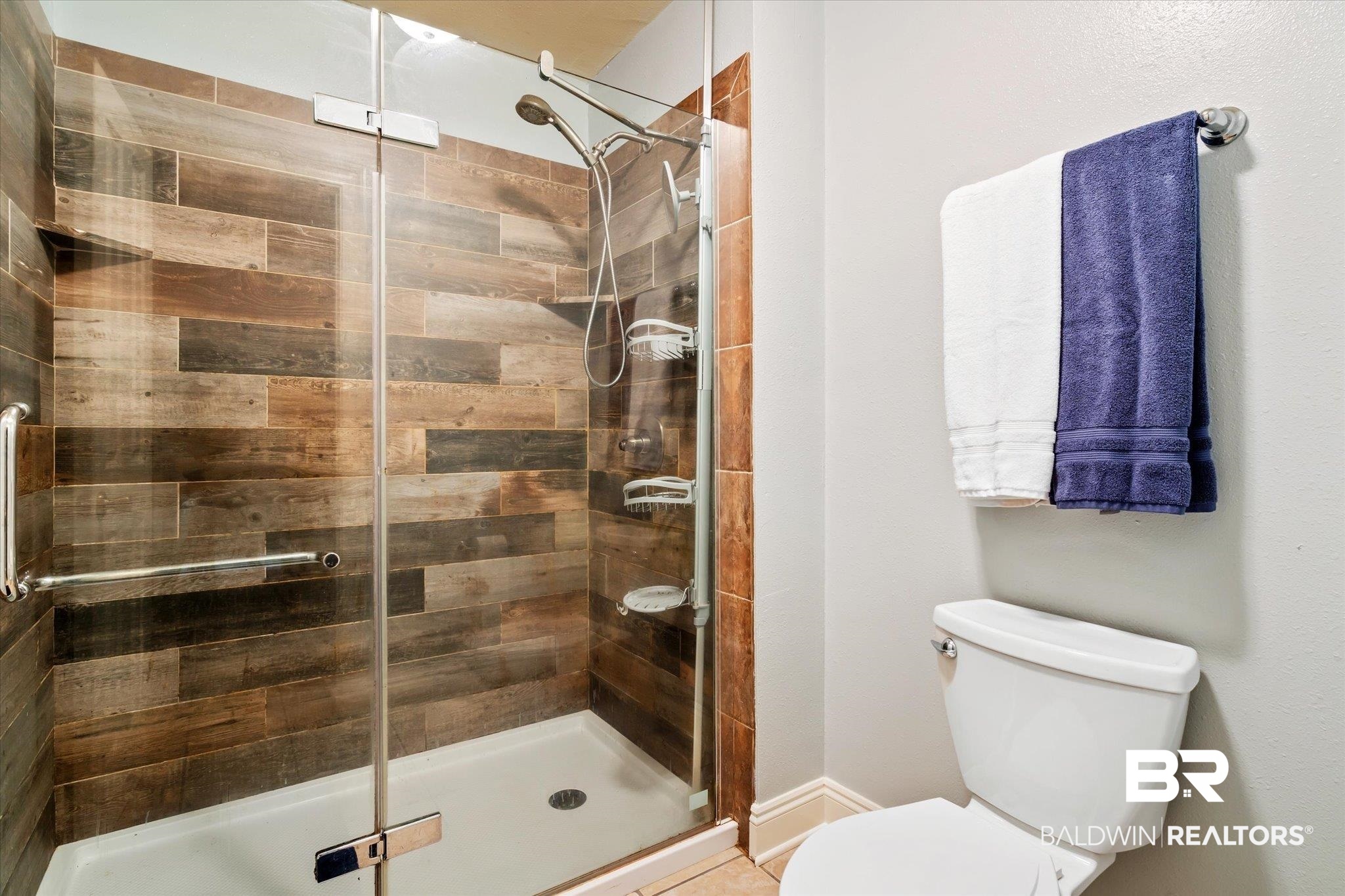 72 Limestone Drive Jackson, AL 36545 - Photo 26 of 38 Bathroom featuring toilet and a shower with shower door