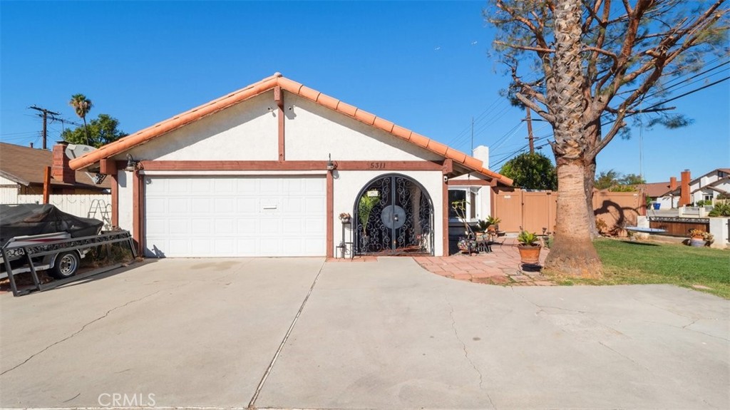 5311 Central Avenue Riverside, CA 92504 - Photo 1 of 1 a view of a house with outdoor space and trees