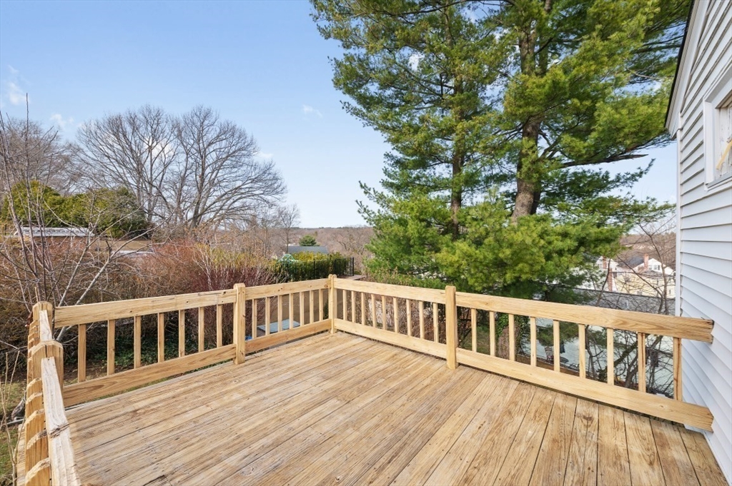 15 Shawmut Road Waltham, MA 02452 - Photo 37 of 40 a view of a house with a deck