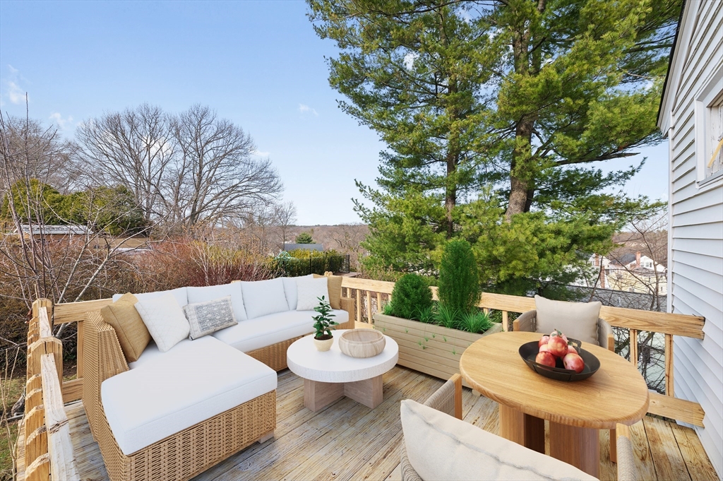 15 Shawmut Road Waltham, MA 02452 - Photo 38 of 40 a view of a table and chairs in the patio
