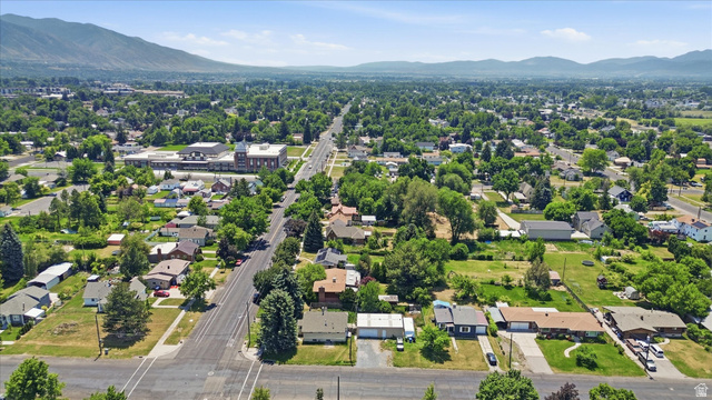 395 North 400 West Logan, UT 84321 - Photo 35 of 48 Expansive aerial view showcasing a residential area with varied housing styles and mature landscaping