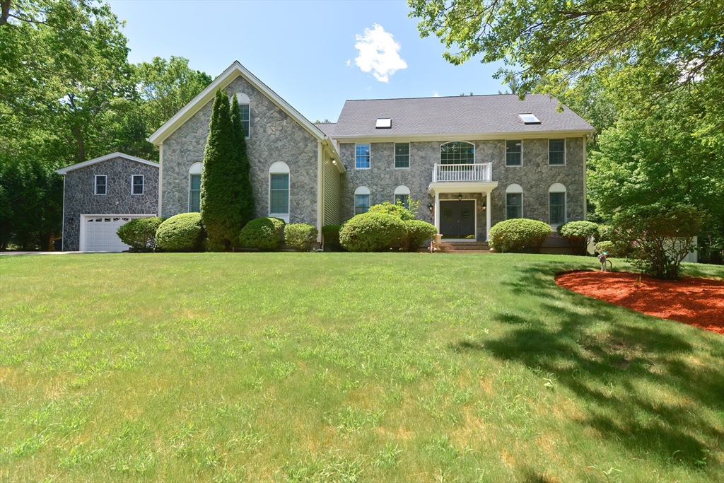 23 Newell Drive Franklin, MA 02038 - Photo 2 of 35 a view of a house with backyard and porch