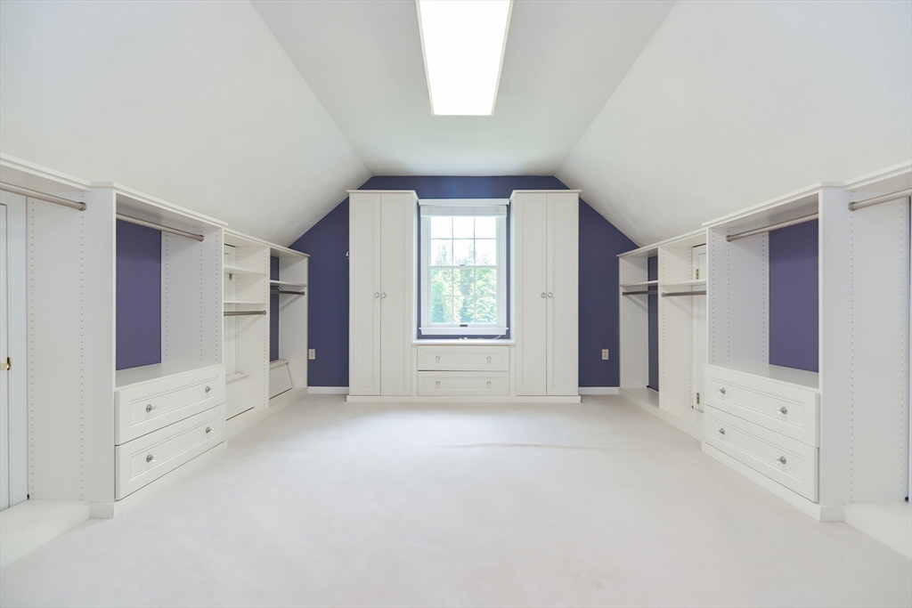 23 Newell Drive Franklin, MA 02038 - Photo 22 of 35 wooden floor in an empty room with a window and a kitchen