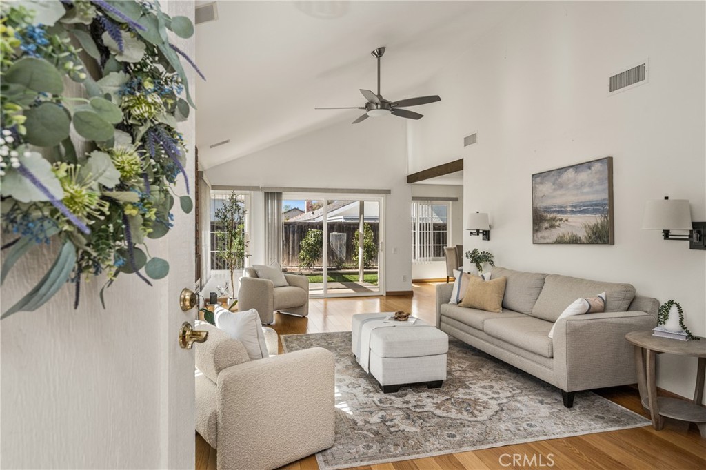 6 Whitecloud Irvine, CA 92614 - Photo 3 of 45 a living room with furniture and a large window