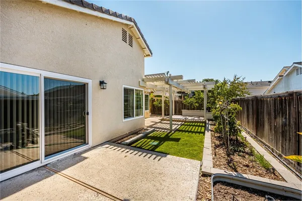 a house view with a garden space