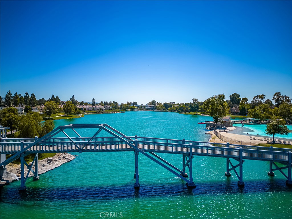 6 Whitecloud Irvine, CA 92614 - Photo 45 of 45 a view of a lake with couches and wooden fence