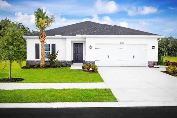 a view of a house with a garden