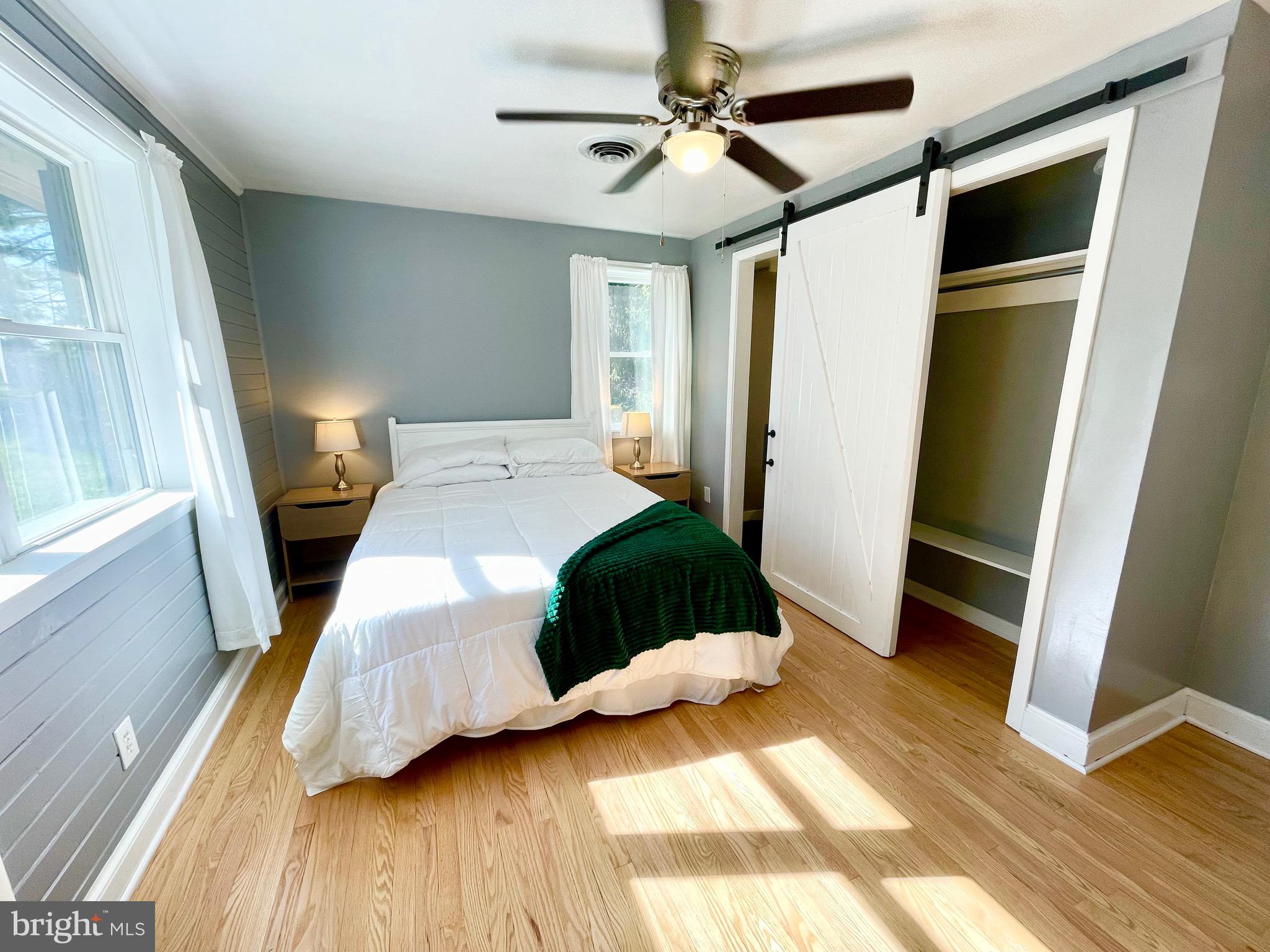 28321 Kemptown Road Damascus, MD 20872 - Photo 12 of 57 a bedroom with a bed and a walk in closet