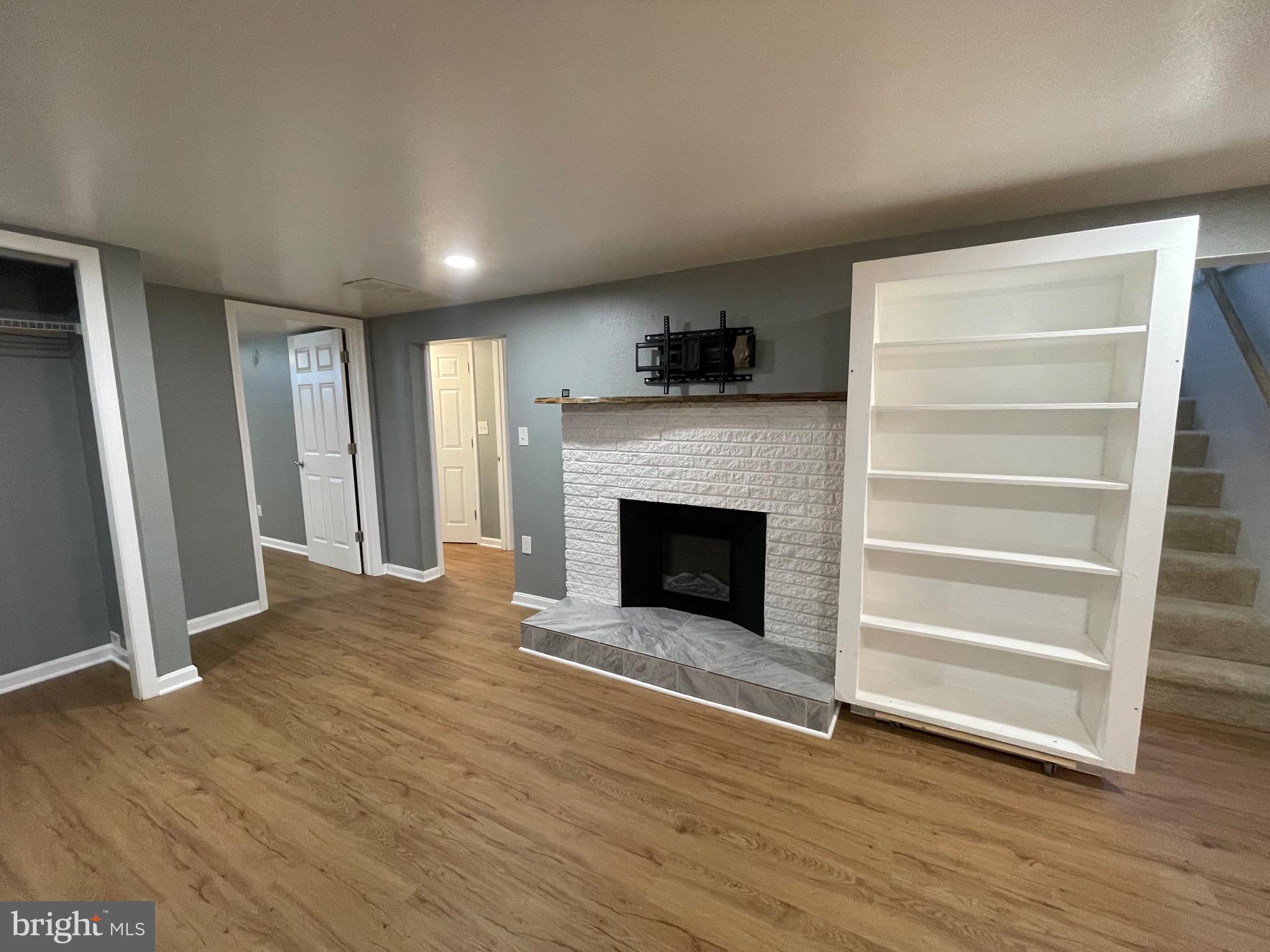 28321 Kemptown Road Damascus, MD 20872 - Photo 18 of 57 a view of a livingroom with a fireplace