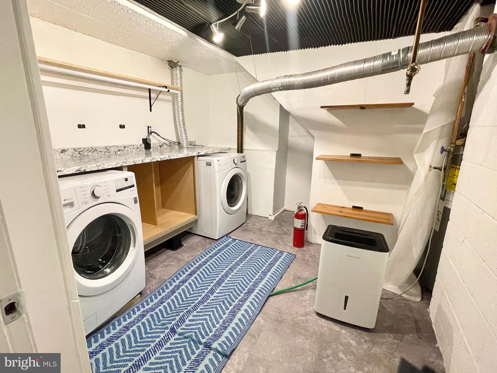 28321 Kemptown Road Damascus, MD 20872 - Photo 29 of 57 a utility room with dryer and washer