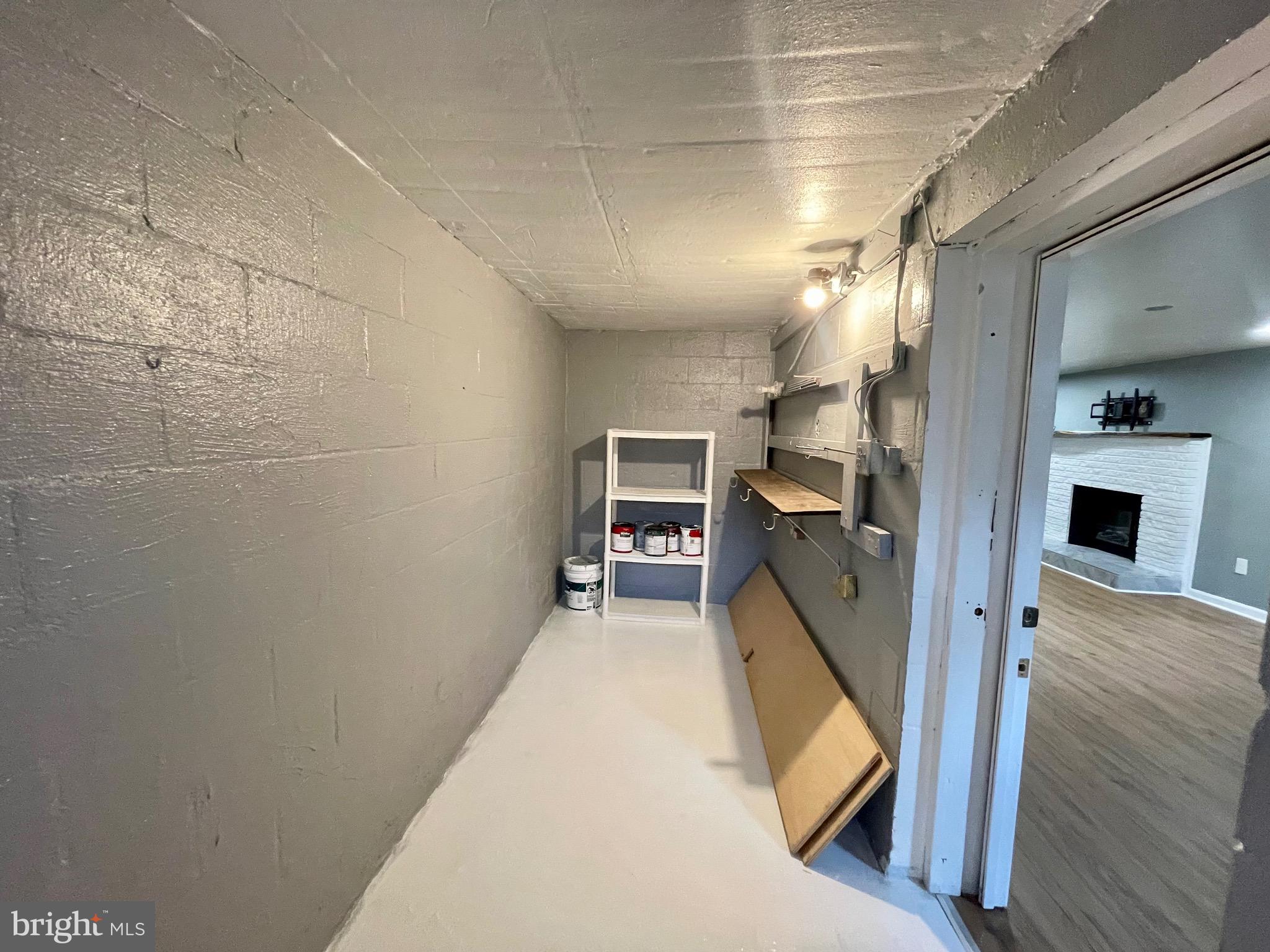 28321 Kemptown Road Damascus, MD 20872 - Photo 30 of 57 a view of a hallway with wooden floor and staircase