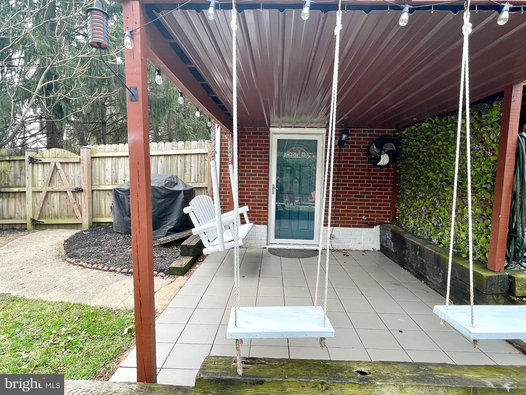 28321 Kemptown Road Damascus, MD 20872 - Photo 36 of 57 a house view with a sitting space and garden space