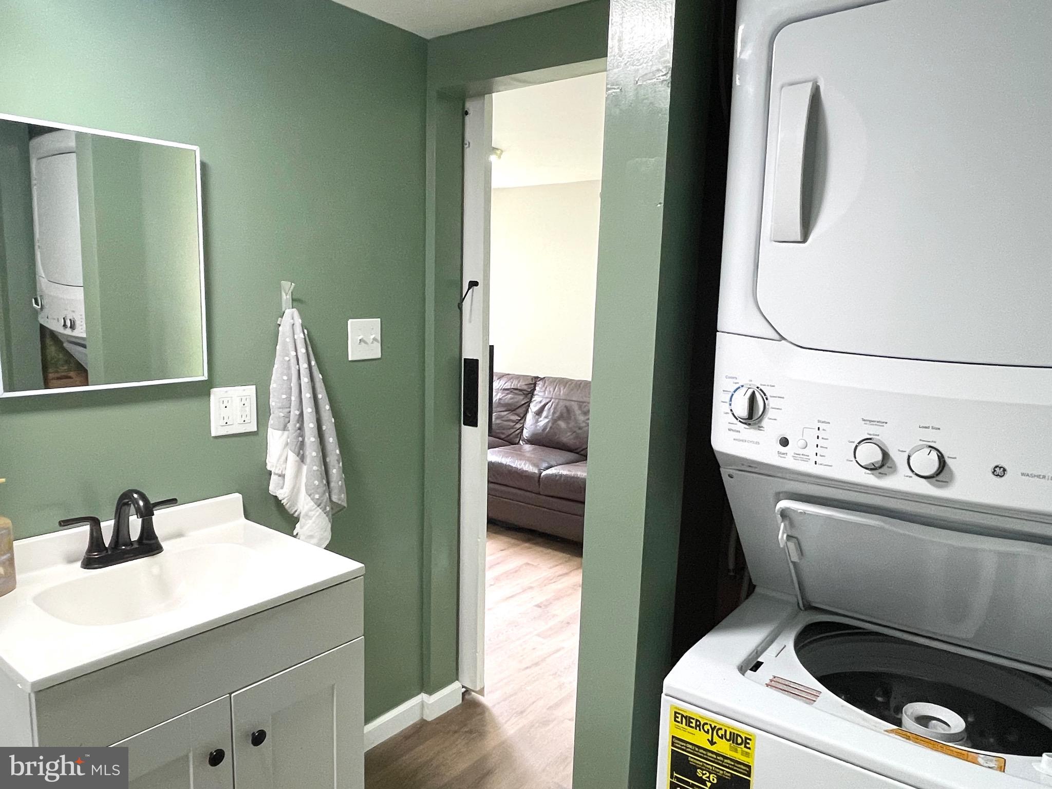 28321 Kemptown Road Damascus, MD 20872 - Photo 46 of 57 a utility room with dryer and washer