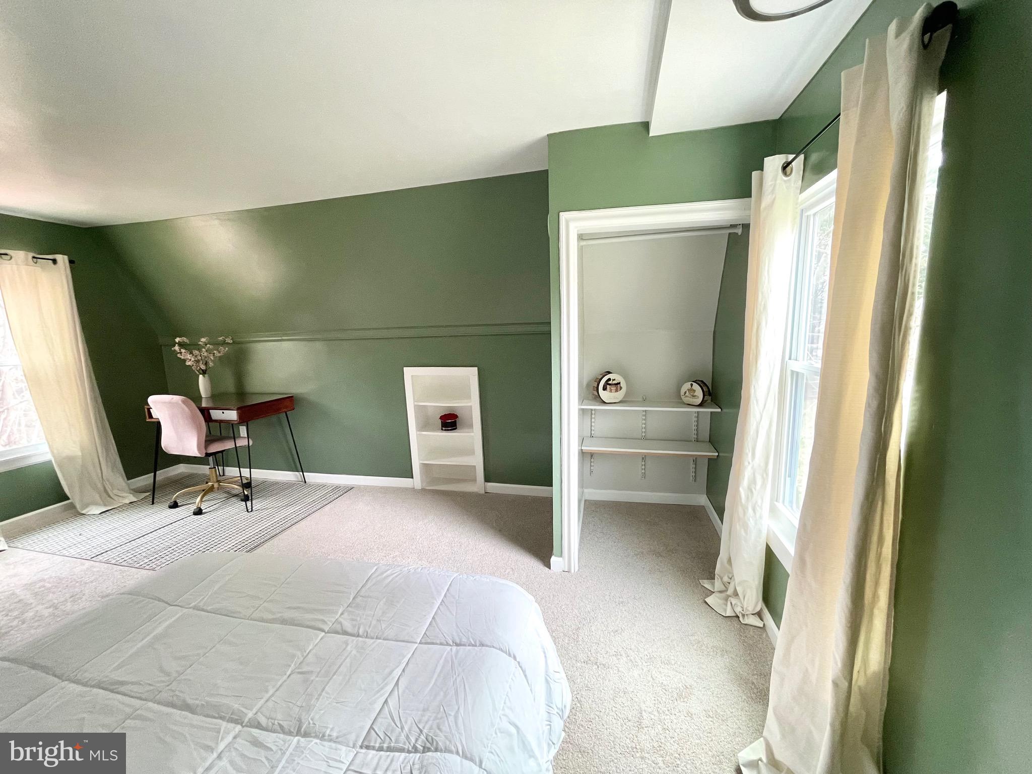 28321 Kemptown Road Damascus, MD 20872 - Photo 52 of 57 a bedroom with a bed and furniture