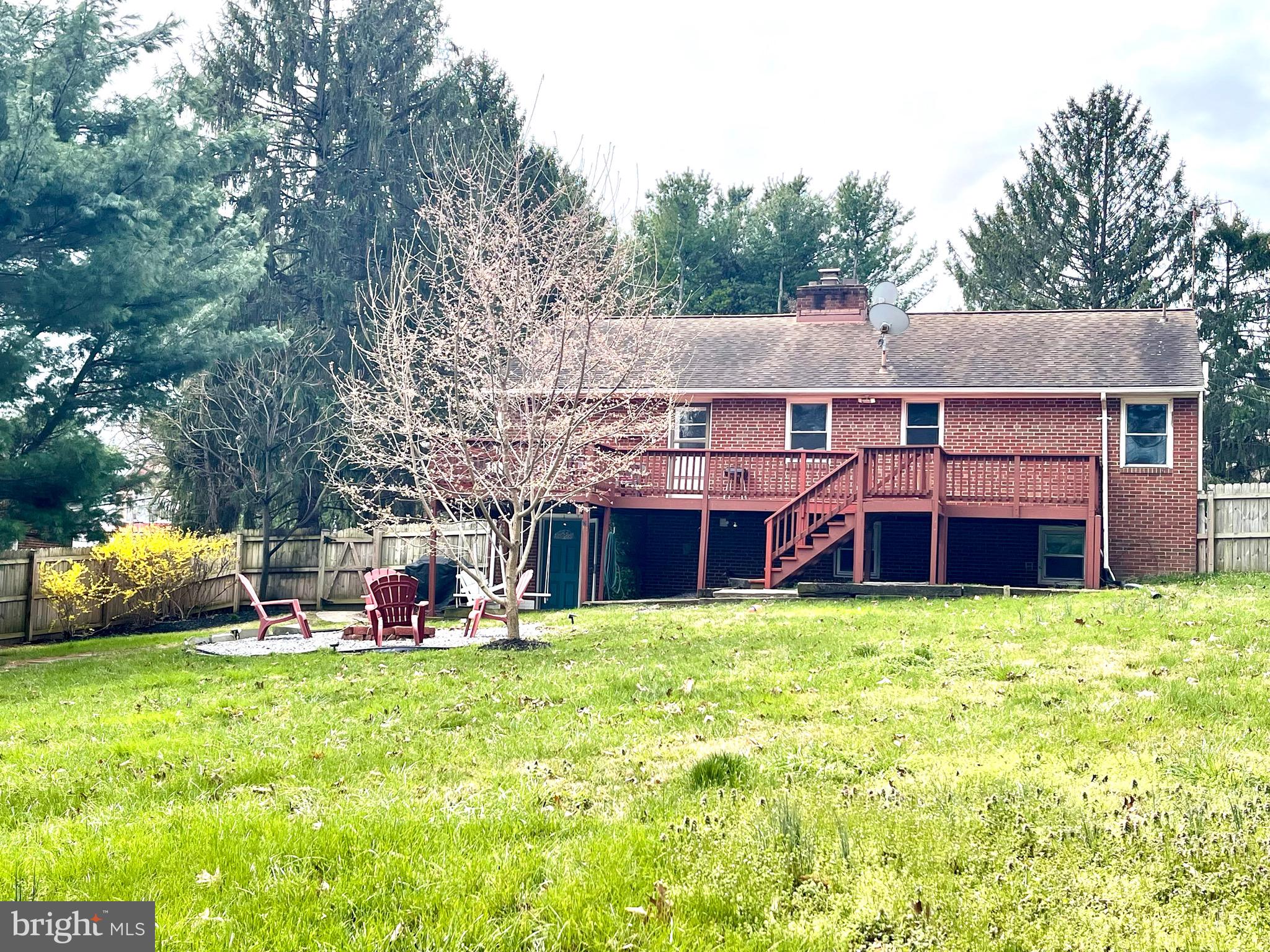 28321 Kemptown Road Damascus, MD 20872 - Photo 54 of 57 a view of a house with a yard and sitting area