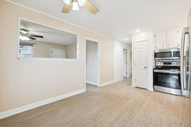 a view of a livingroom with a flat screen tv