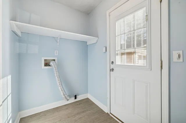 a house with yard in front of it