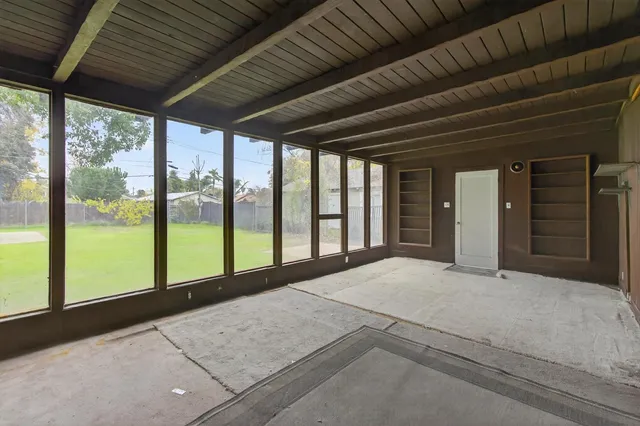 a brick house with yard