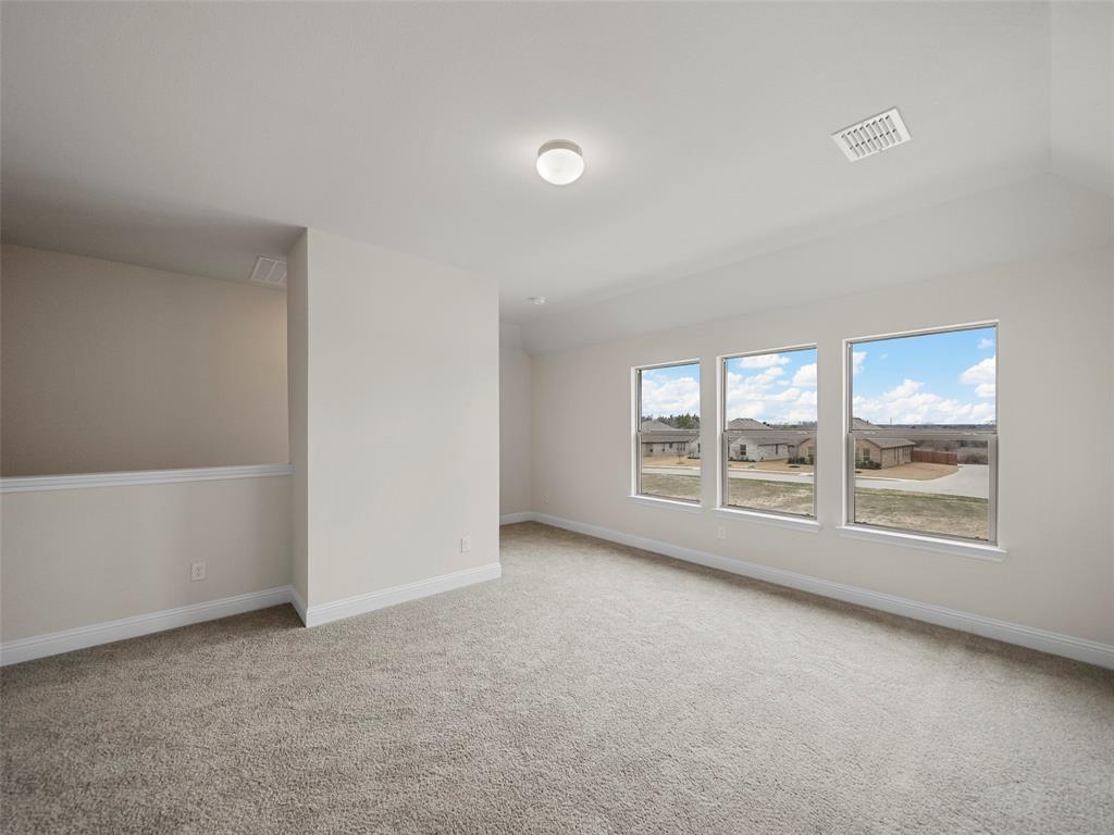 1505 Pegasus Drive Lancaster, TX 75134 - Photo 4 of 10 a view of an empty room with a window