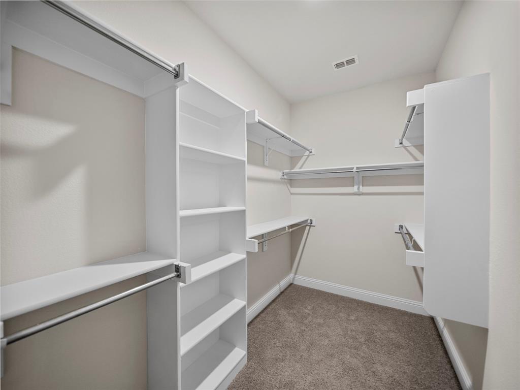 1505 Pegasus Drive Lancaster, TX 75134 - Photo 5 of 10 a view of an empty walk in closet