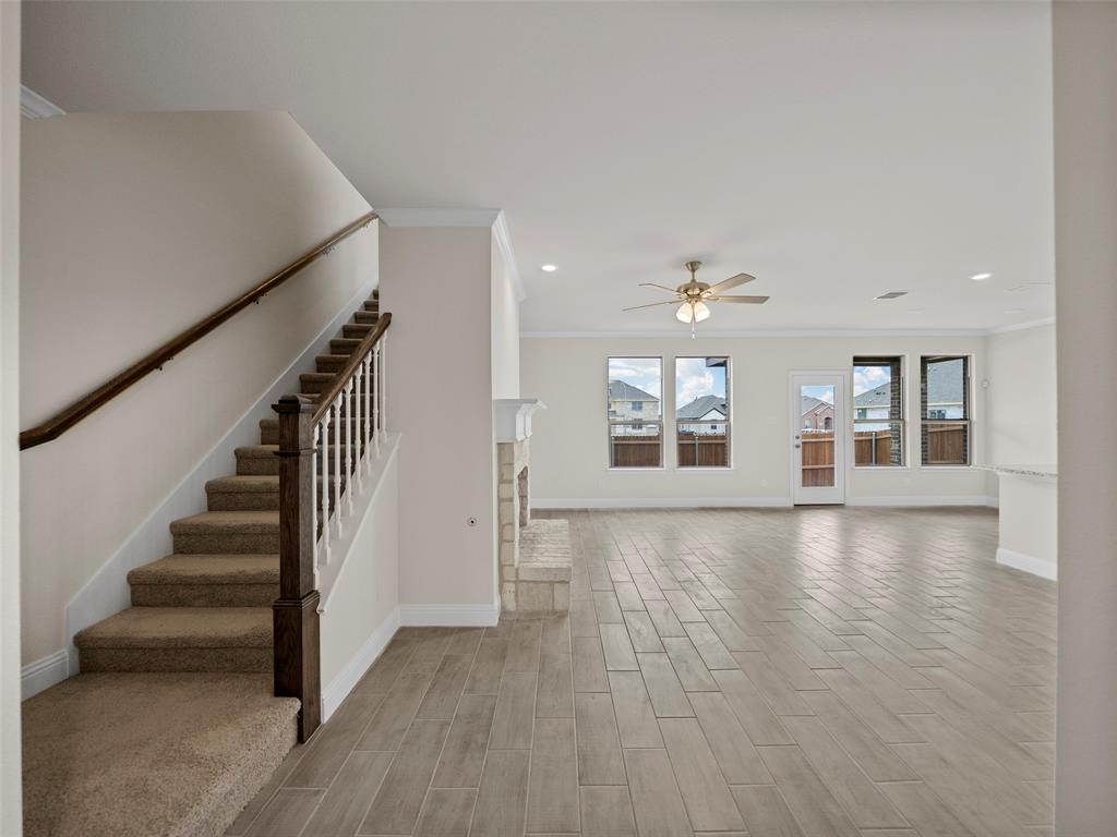 1505 Pegasus Drive Lancaster, TX 75134 - Photo 9 of 10 wooden floor in an empty room with a window