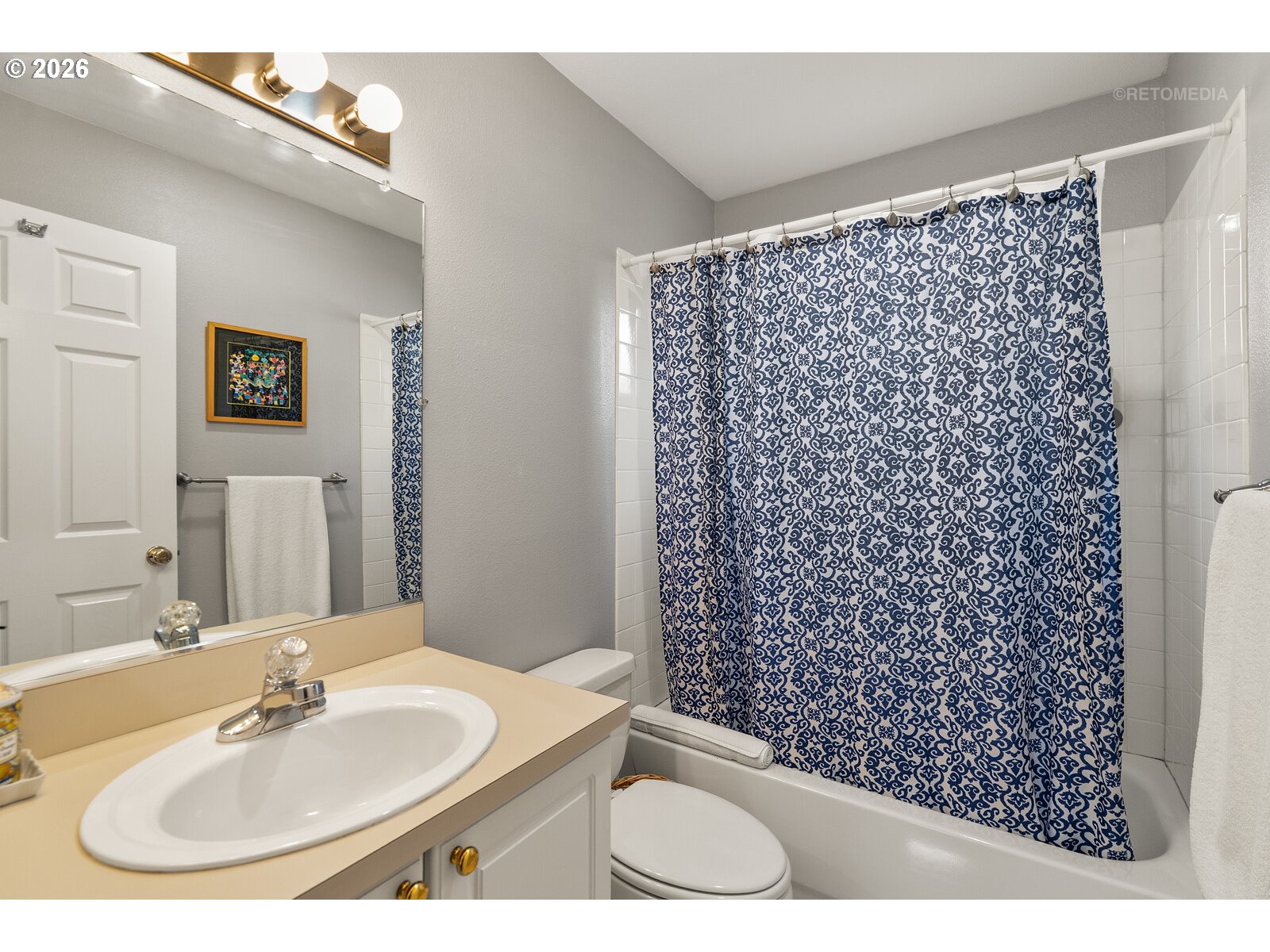 8325 Southwest Seneca Street Tualatin, OR 97062 - Photo 25 of 39 a bathroom with a sink and a mirror