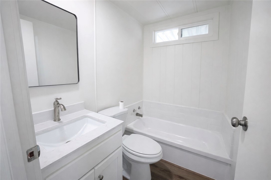 2140 Robin Avenue, Unit 2140A Oxnard, CA 93033 - Photo 10 of 17 a bathroom with a sink toilet and shower