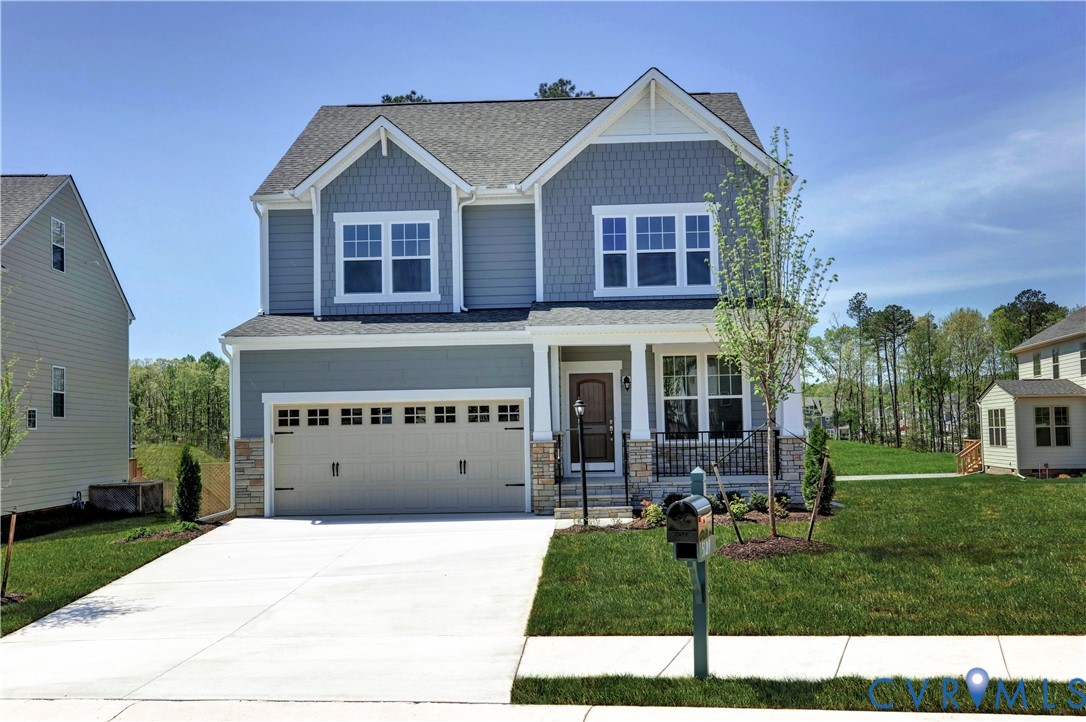 925 Charlemagne Road Midlothian, VA 23114 - Photo 2 of 43 a front view of a house with a yard