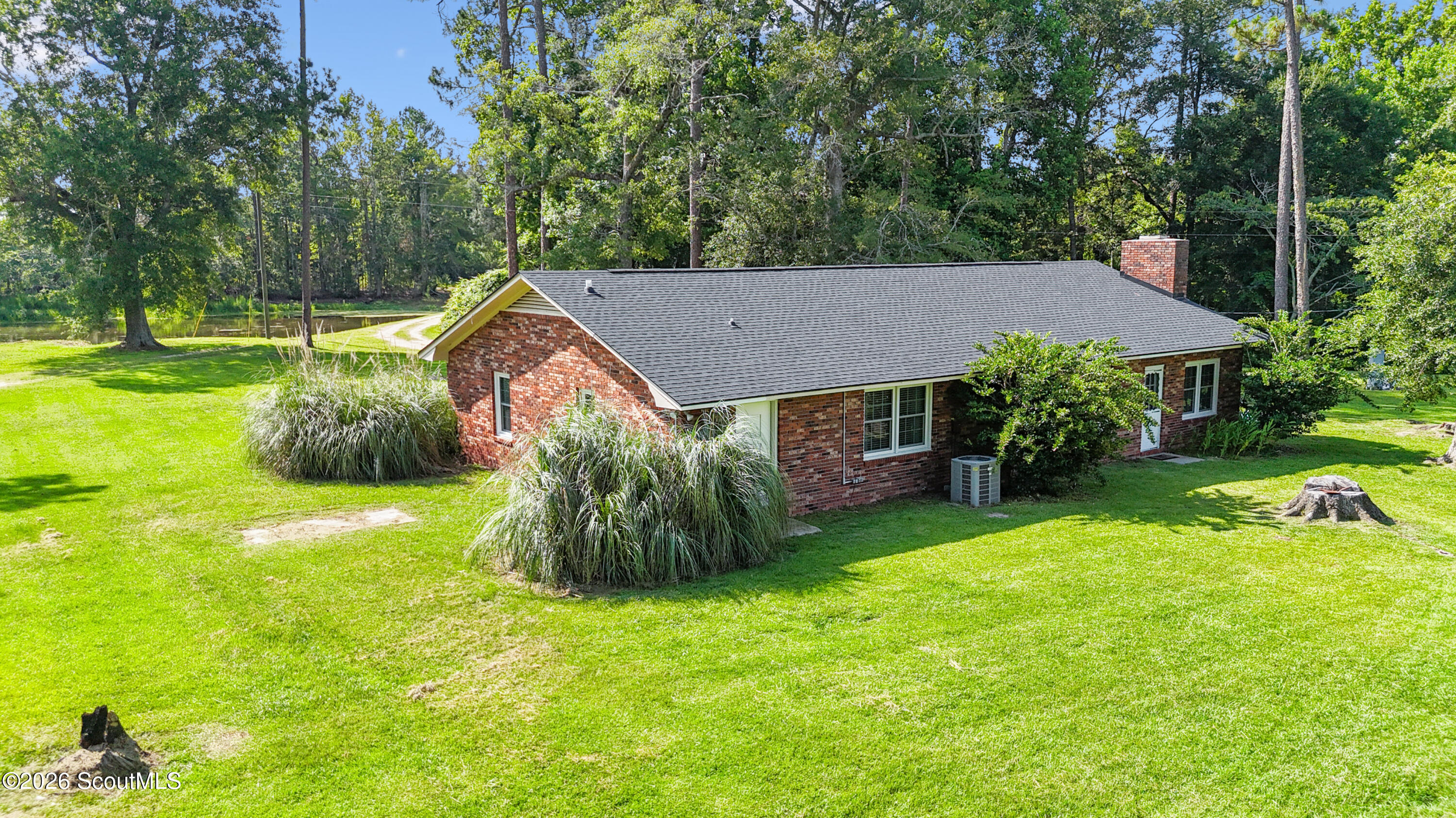 212 Lynwood Road Jesup, GA 31545 - Photo 9 of 76 DJI_20260629165347_0221_D