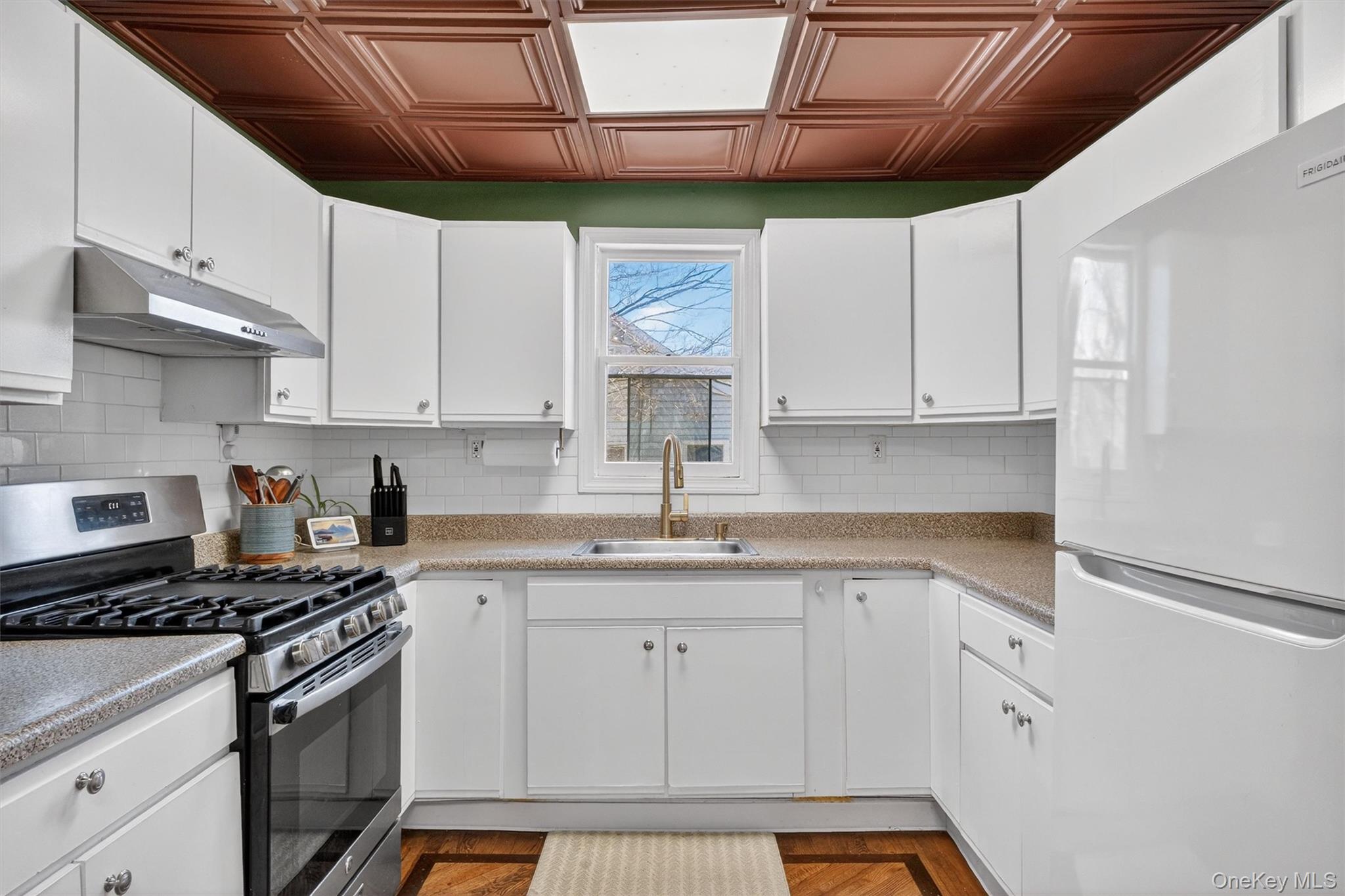 175 Terry Hill Road Carmel, NY 10512 - Photo 12 of 33 a kitchen with stainless steel appliances granite countertop a sink stove and cabinets