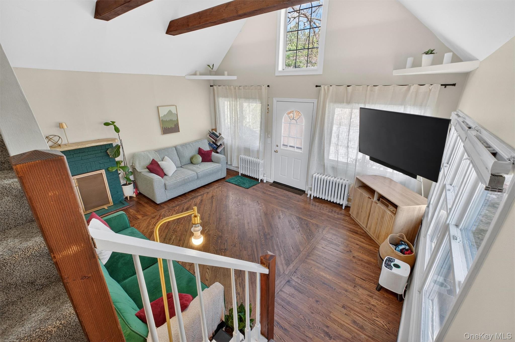 175 Terry Hill Road Carmel, NY 10512 - Photo 17 of 33 a living room with furniture and a flat screen tv