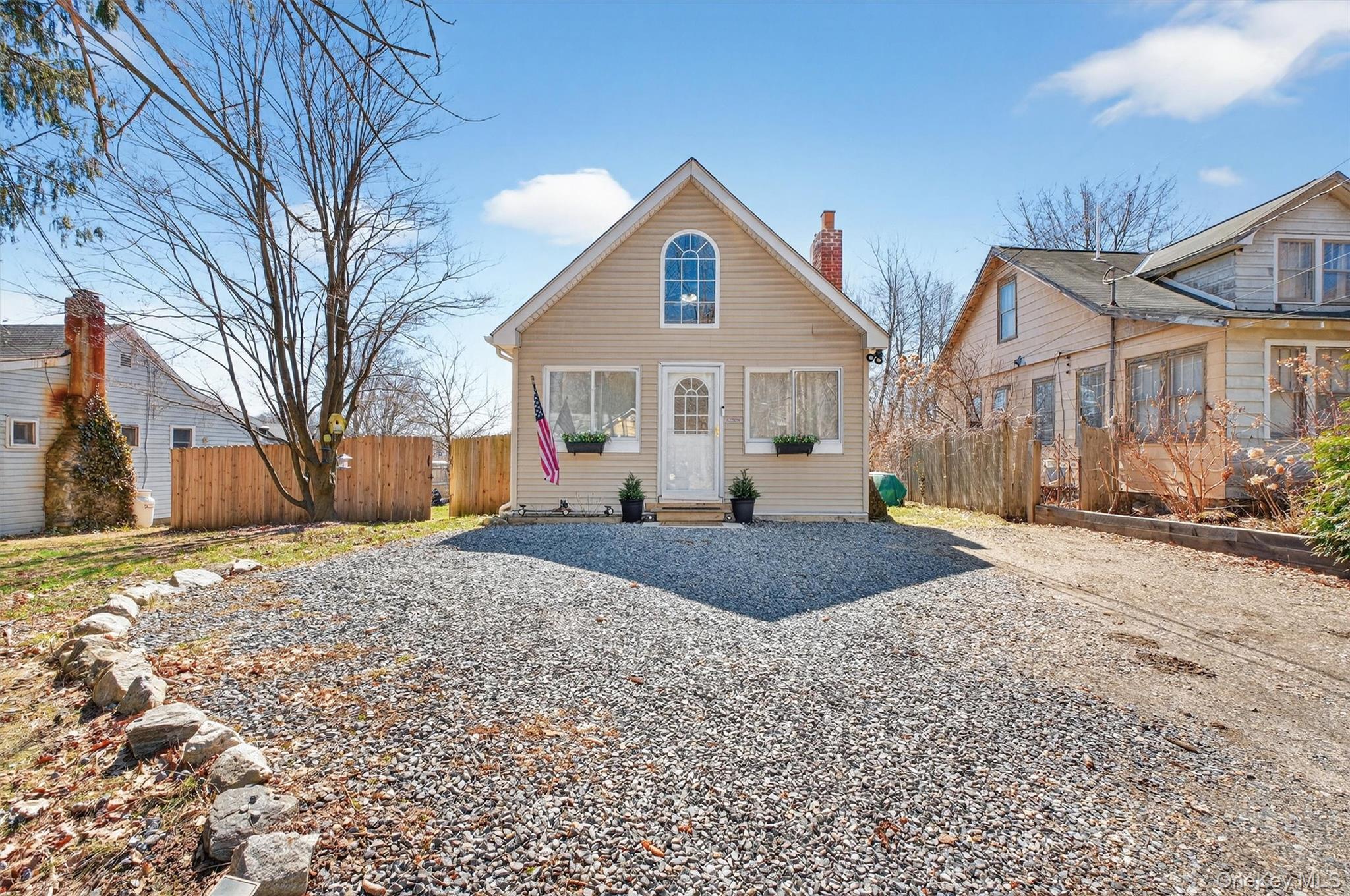 175 Terry Hill Road Carmel, NY 10512 - Photo 2 of 33 a front view of a house with a yard and garage