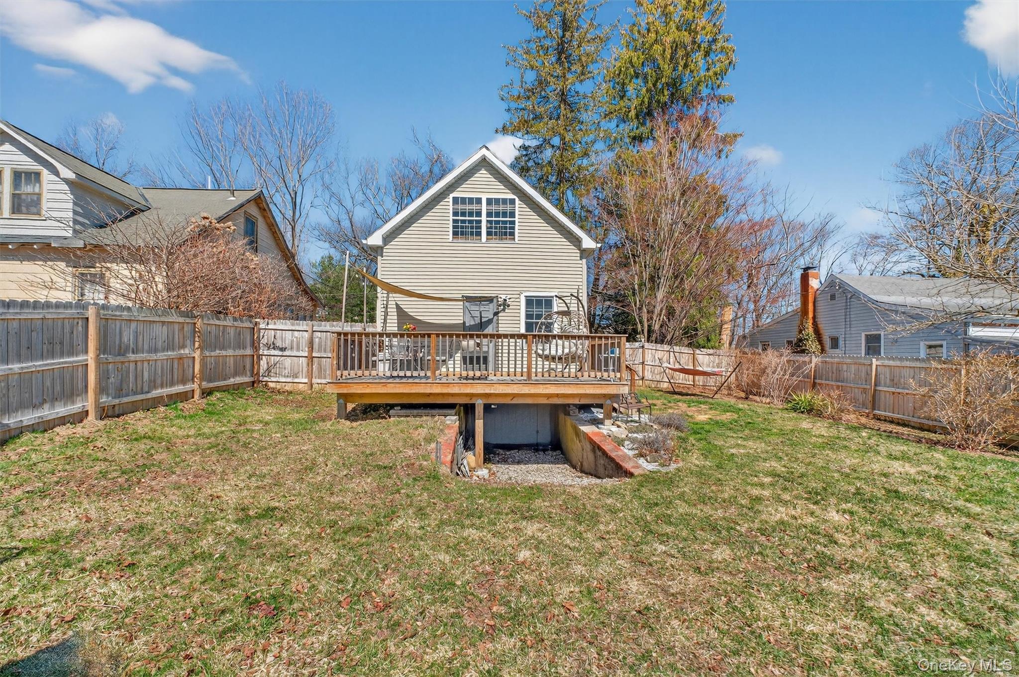 175 Terry Hill Road Carmel, NY 10512 - Photo 28 of 33 a backyard of a house with table and chairs