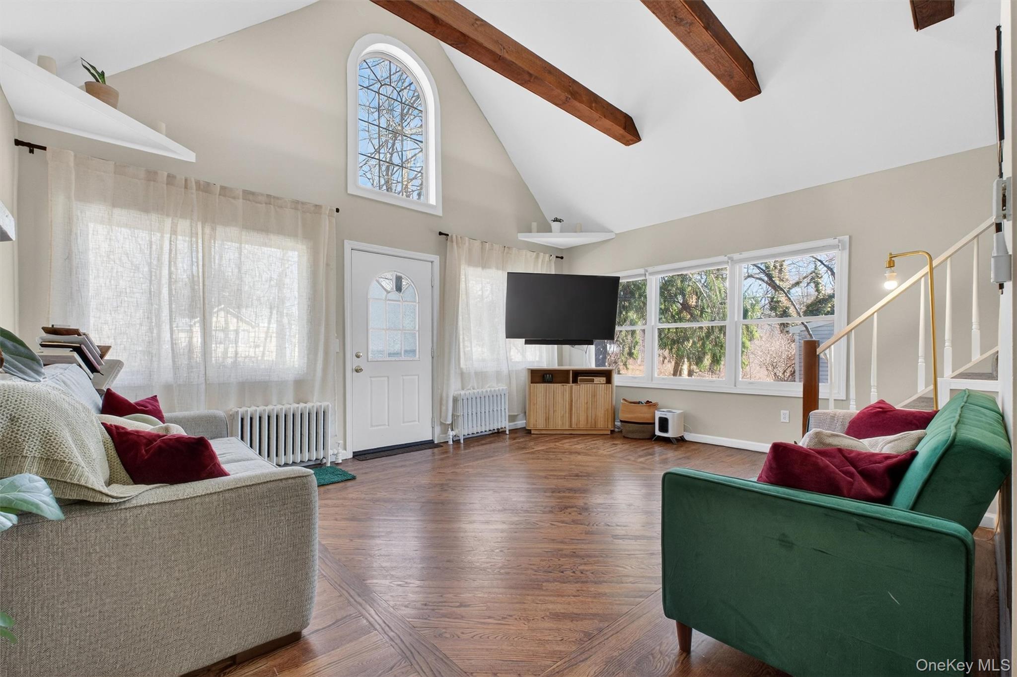 175 Terry Hill Road Carmel, NY 10512 - Photo 4 of 33 a living room with furniture and a flat screen tv