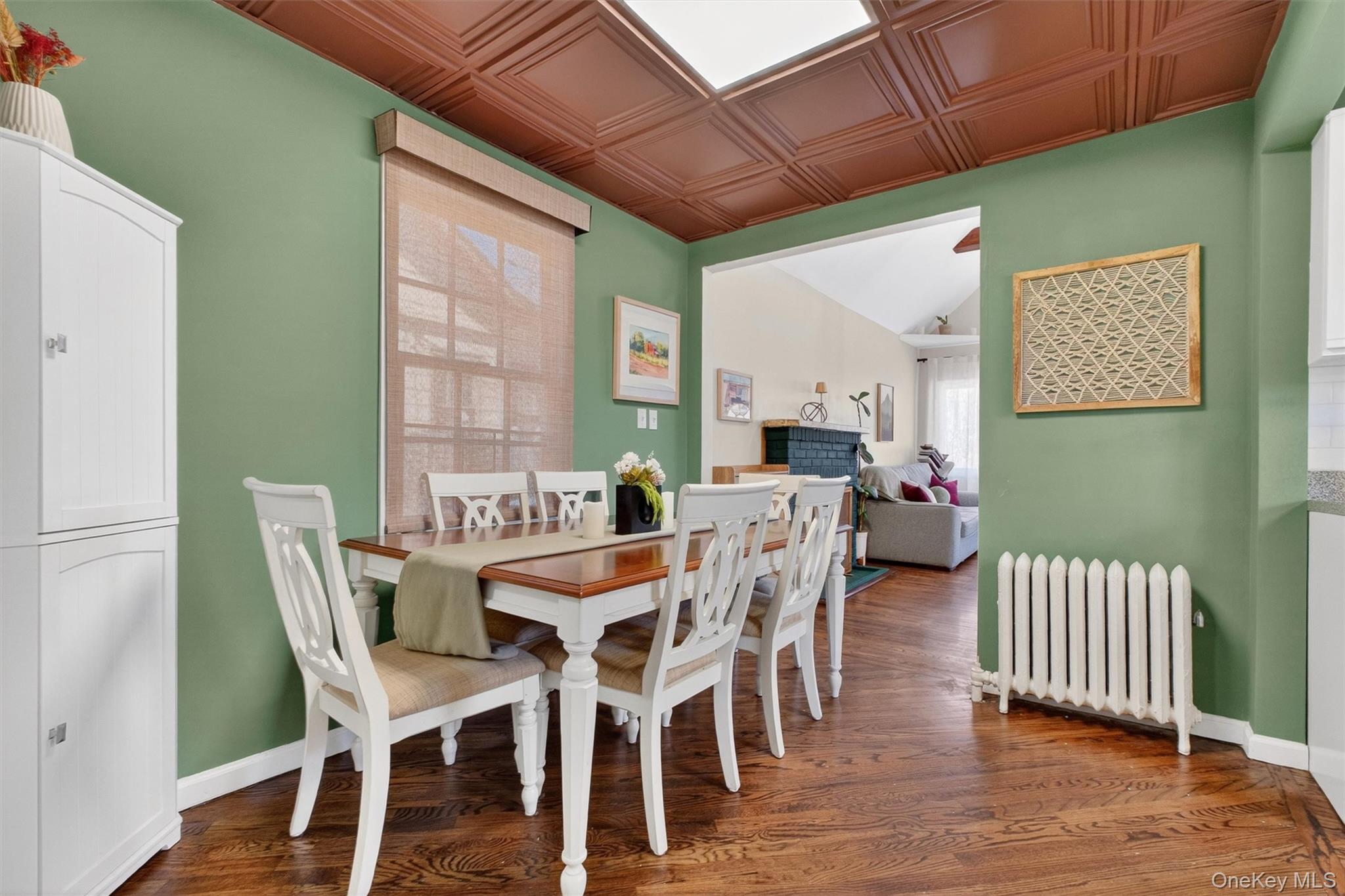 175 Terry Hill Road Carmel, NY 10512 - Photo 9 of 33 a view of a dining room with furniture and wooden floor