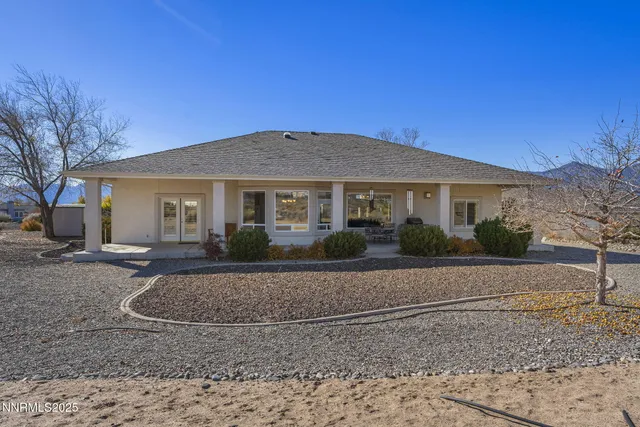 a front view of a house with yard