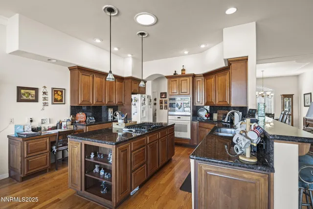 a kitchen that has a lot of cabinets in it