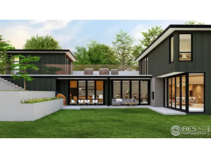 a view of an house with backyard space and deck