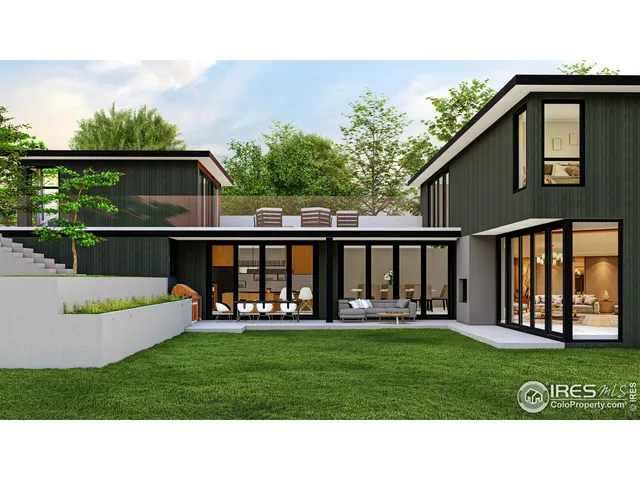 a view of an house with backyard space and deck