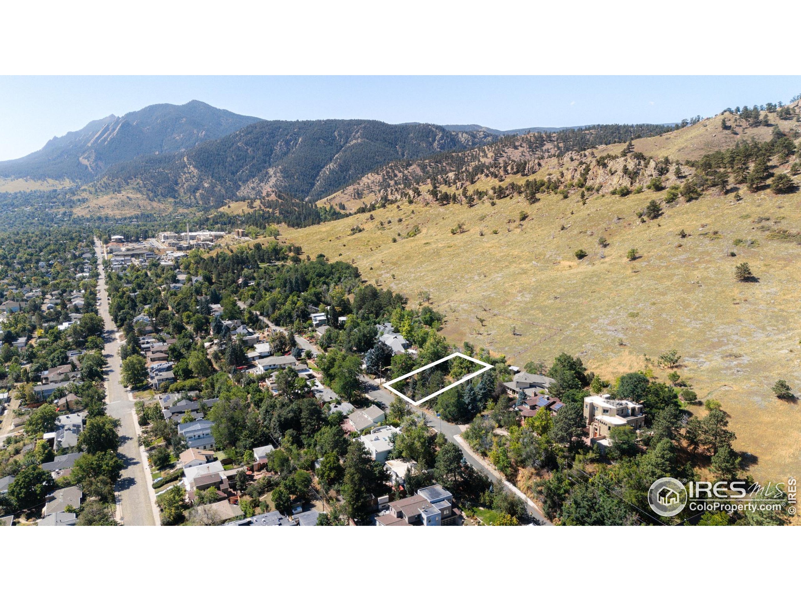 3033 3rd Street Boulder, CO 80304 - Photo 4 of 13 a view of a city with mountains in the background