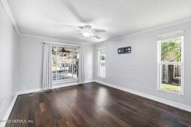 a view of a house with swimming pool and sitting area