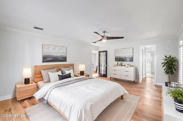 a front view of a house with a big yard