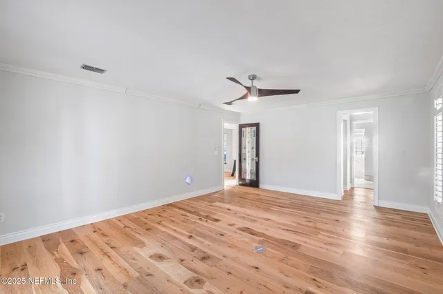 a front view of a house with swimming pool having outdoor seating