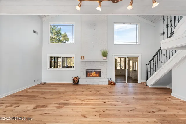 a view of a hallway with a window